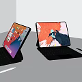 Tablet Laptops with Keyboard and Stylus Pen Displaying Colorful App Screens and Art Design