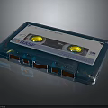 BASF Blue Cassette Tape Electronic Audio Storage Device With Yellow Reels And Orange Slots