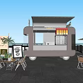 Stylish Food Truck Restaurant With Outdoor Tables And Modern Building Background