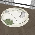 Modern White Round Rug with Green Patterns on Wooden Floor in Home Interior