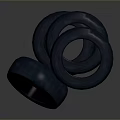 Multiple Stacked Black Rubber Tires for Automotive Vehicle Use and Storage