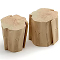 Two Natural Wood Tree Stump Shaped Stools With Rustic Texture And Tree Rings