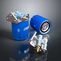 Blue Cylindrical Filters With Metal Fittings And Exposed Internal Components On Dark Surface