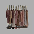 Modern Tech Exhibition Hall Display of Stylish Dresses in Pink Beige Patterns Hanging on Racks with Handbag