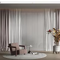 Single Sofa In Living Room With Light Curtains Round Rug And Wooden Floor