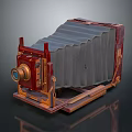 Vintage Folding Camera With Wooden Body Metal Parts And Leather Bellows
