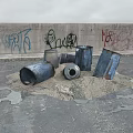 Stone And Wood Elements With Metal Barrels By Graffiti Wall On Sandy Ground