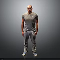 Bald Man Wearing Gray Short Sleeve T Shirt and Gray Sweatpants Standing Pose