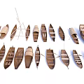 Collection of Various Handcrafted Wooden Boat Models with Traditional Designs