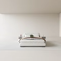Modern White Upholstered Double Bed With Decorative Pillows And Nightstands