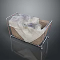 Metal Frame Basket With Dirty Stained Cloth On Reflective Surface