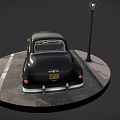 Vintage Black Classic Car Display With Street Lamp On Circular Wet Paved Ground