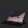 Modern Tablet With Detachable Keyboard Displaying Vibrant Sky And Clouds
