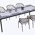 Garden Landscape Outdoor Dining Setup With Rattan Chairs Tableware And Water Glasses