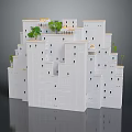 White Multi Layered Architectural Building Model With Green Plants Small Towers And Domed Structures