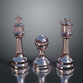 Three Shiny Metallic Chess Pieces With Elegant Reflective Polished Surfaces