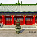 Traditional Chinese Ancient Architecture With Red Pillars Green Roof Carved Eaves And Stone Incense Burner