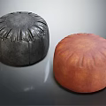 Two Round Leather Poufs in Black and Orange for Living Room Decor