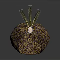 Ornate Decorative Hat With Green Feathers Gold Patterns And Central Pink Gemstone