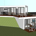 Modern Detached Villa Featuring Spacious Terrace Outdoor Furniture And Glass Windows On Grassland
