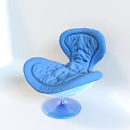 Comfortable Blue Modern Lounge Chair With Padded Wing Design And Transparent Base