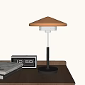 Modern Table Lamp With Orange Umbrella Shade Black Pole And Silver Base On Wooden Desk