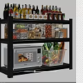 Spice Bottles on Black Kitchen Shelf with Dry Goods Jars Microwave and Fresh Vegetables