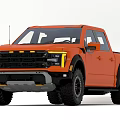 Orange Off Road Pickup Truck With Bold Front Grille And Large Tires