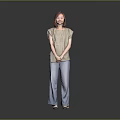 Woman in Light Colored Top and Blue Jeans Standing Against Gray Background
