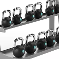 Black Kettlebells With Blue Circles On Multi Shelf Fitness Equipment Storage Rack