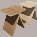 Two Modern Wooden Stools With Cross Legged Structure And Wood Tones