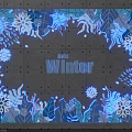 Winter Themed Decorative Display With Blue Leaves Snowflakes And Hello Text