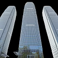 Three Modern Tall Office Buildings With Glass Curtain Walls And Reflective Surfaces