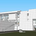 Modern Office Building With White Exterior Large Glass Windows And Trees