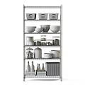 Stainless Steel Storage Shelves with Black Baskets Pots Jars Food Items and Wicker Basket