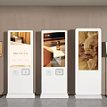 Multiple White Vertical Digital Signage Kiosks With Display Stands Showing Images In Commercial Space