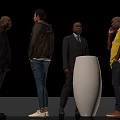 Group of Four Men Standing Around Large White Decorative Vase in Black Background