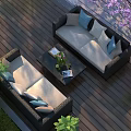 Modern Outdoor Patio With Wicker Sofas Light Gray Blue Cushions Wooden Deck And Green Plants