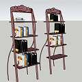 Two Stylish Red Frame Multi Tier Bookcases With Books On Shelves