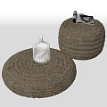 Round Woven Rope Stools in Gray with Small Glass Bottle and Rolled Magazine