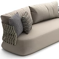 Beige Sectional Sofa With Woven Armrests And Decorative Pillows For Living Room