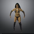 Woman In Black Bikini With Patterned Arm Cuffs And Long Boots Standing Pose
