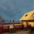 Detached Villa With Thatched Roof Red Railings Open Terrace Trees And Flying Birds Under Sky