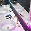 Modern Bathroom Interior With Colorful LED Mirror Double Sinks And White Vanity