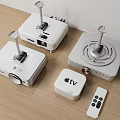 Professional Projection Monitoring Setup with Multiple Projectors Apple TV and Remote Control on Wooden Table