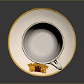 Elegant White Teacup With Gold Rim And Decorative Handle On Saucer