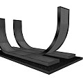 Modern Landscape Sculpture With Three Curved Metal Structures And Textured Base