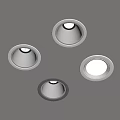 Four Recessed Ceiling Lights With White And Gray Trim On Gray Ceiling