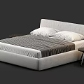 Modern Upholstered Double Bed With Gray Striped Quilt White Pillows And Small Round Side Tables