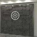 Modern Bedroom Accent Wall With Gray Stone Brick Texture And White Circular Decor